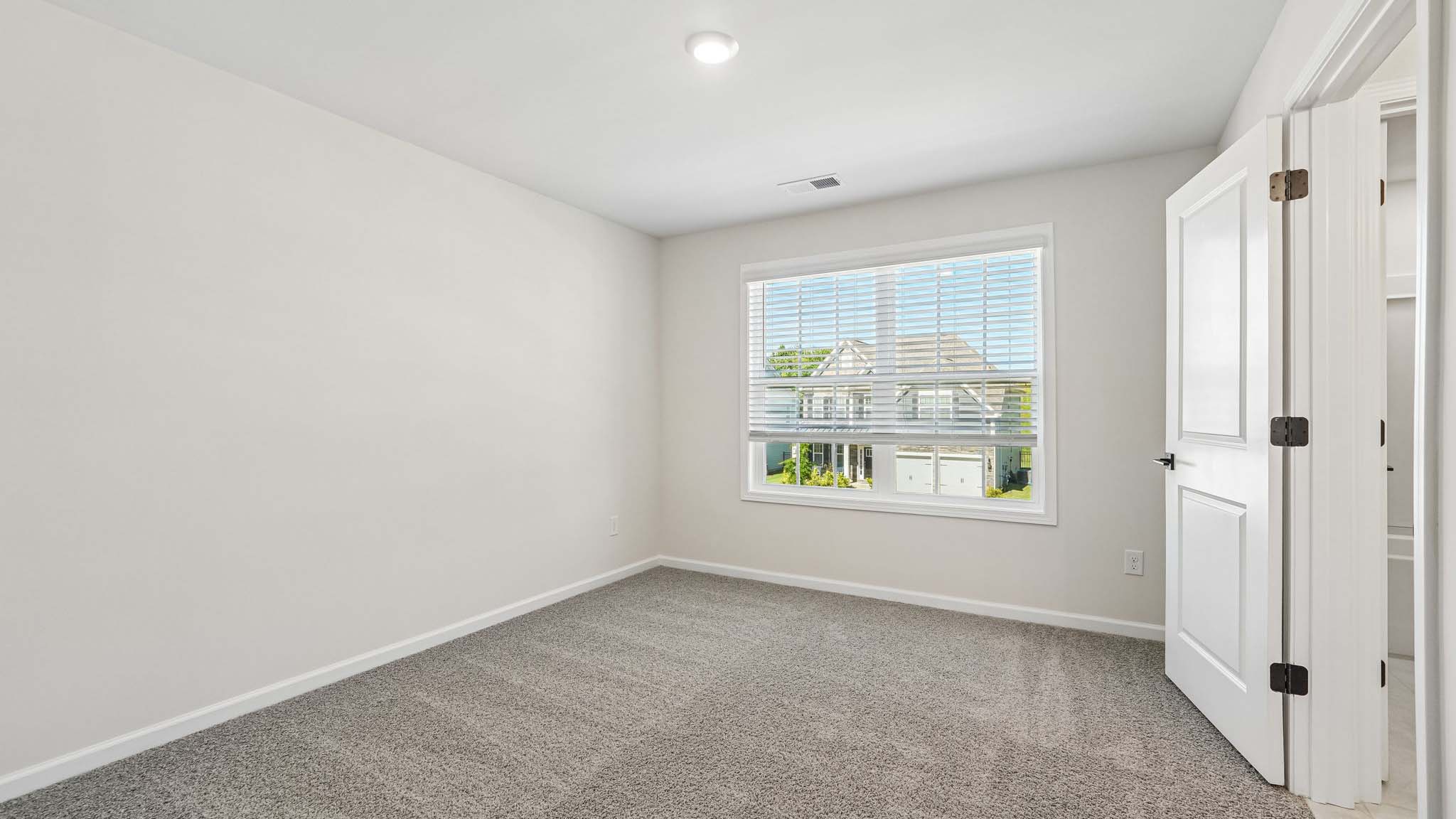 Carpeted bedroom