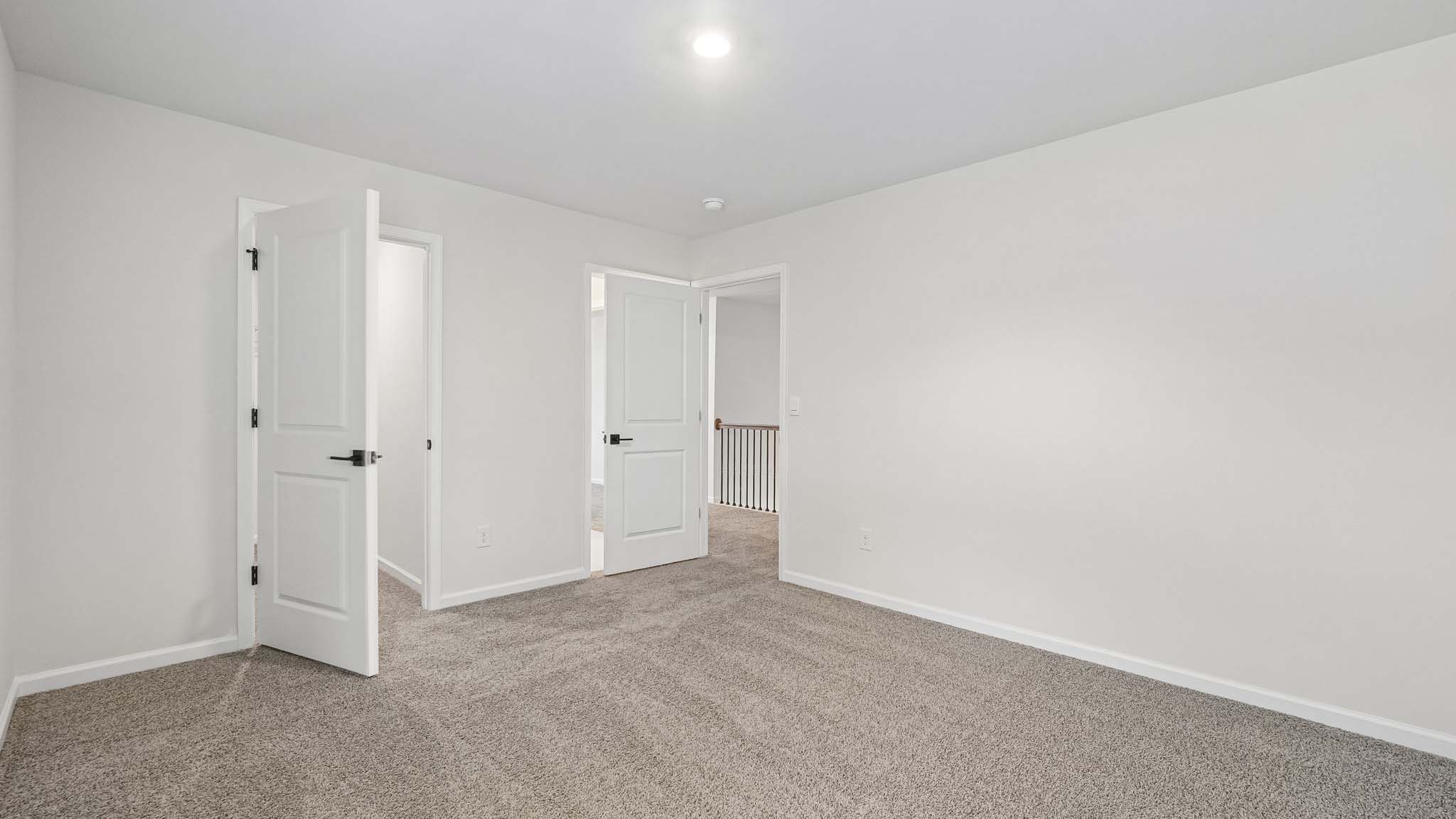 Carpeted bedroom