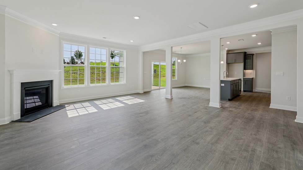 Family room with fireplace and large windows