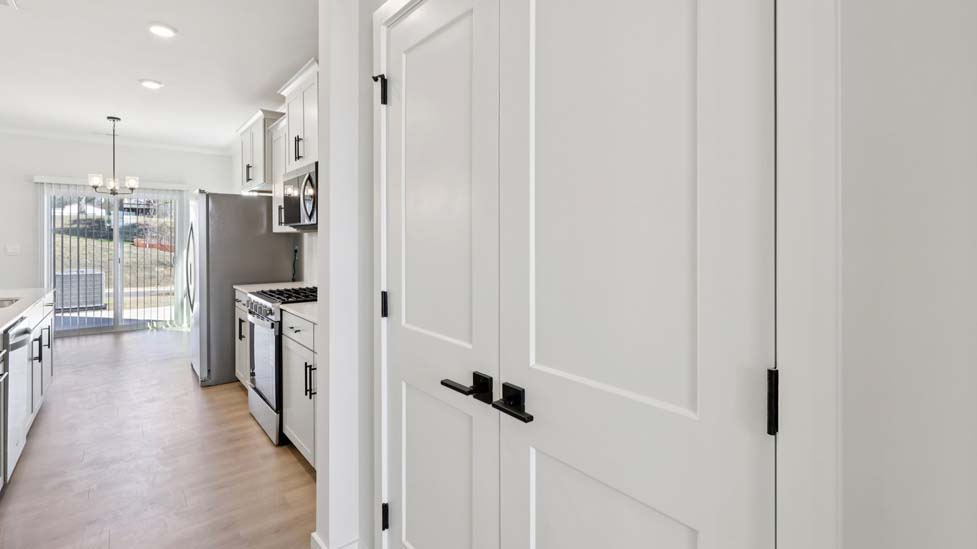 Kitchen and island with stainless steel appliances