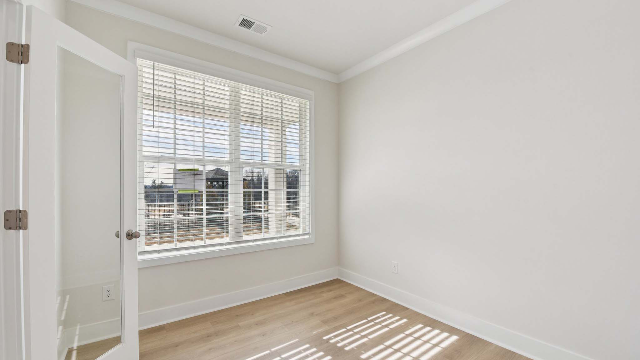 Flex room with french doors and large window
