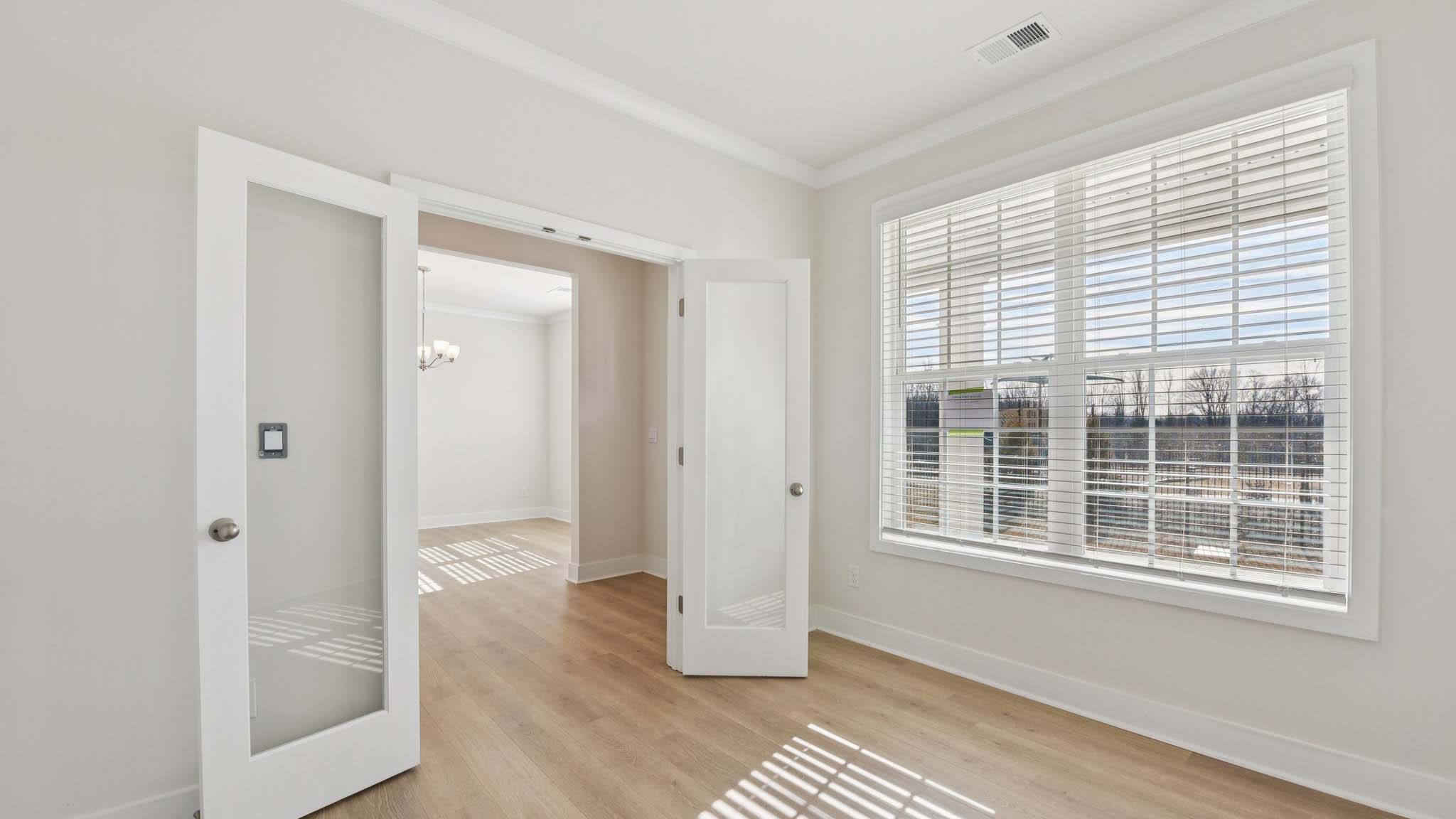 Flex room with french doors and large window