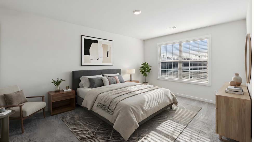 Carpeted bedroom with large window