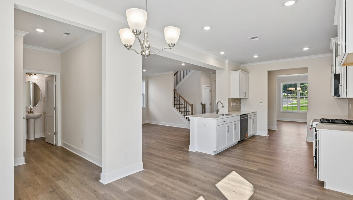 Kitchen and island with stainless steel appliances
