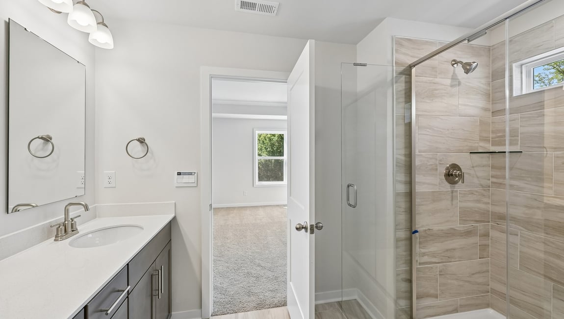 Primary bathroom with standing glass shower