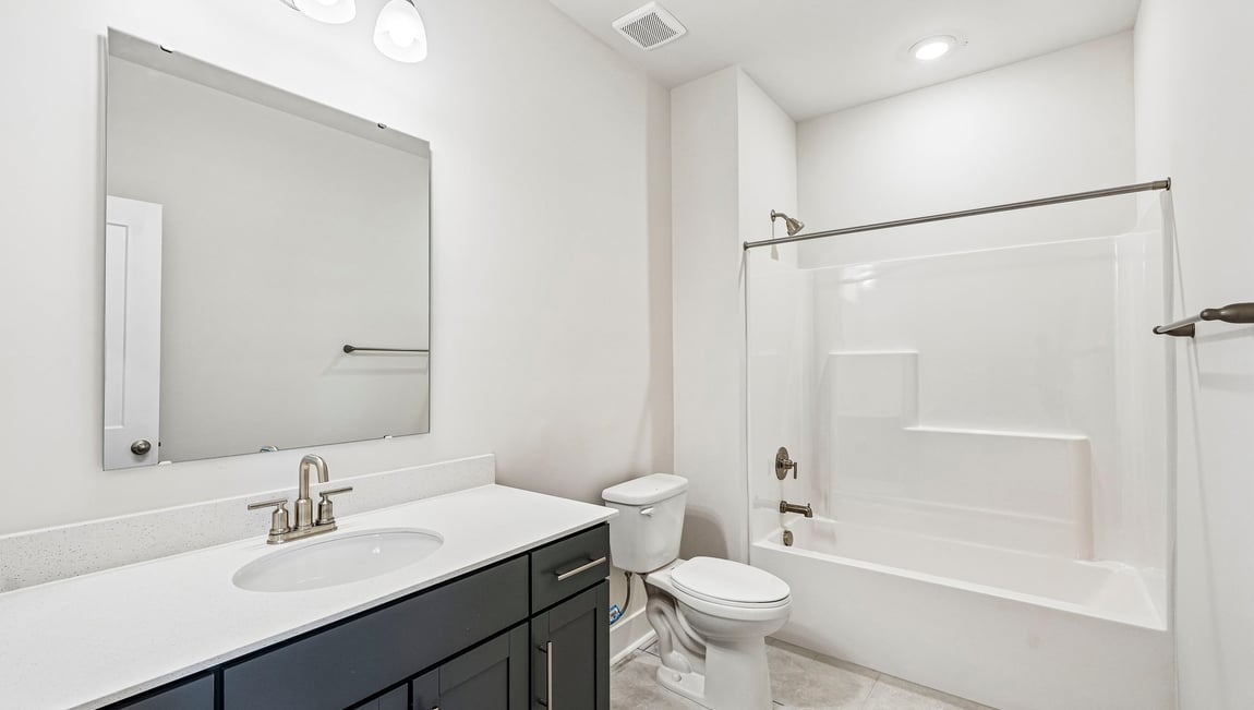 Bathroom with bathtub and shower combintation
