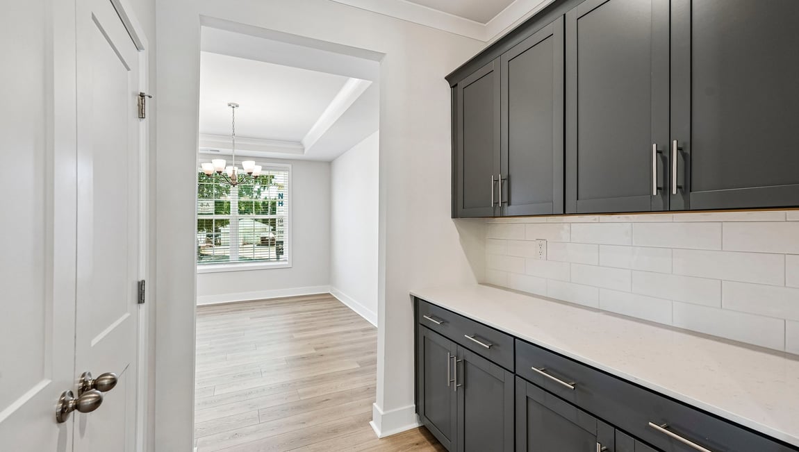 Kitchen and island with stainless steel appliances
