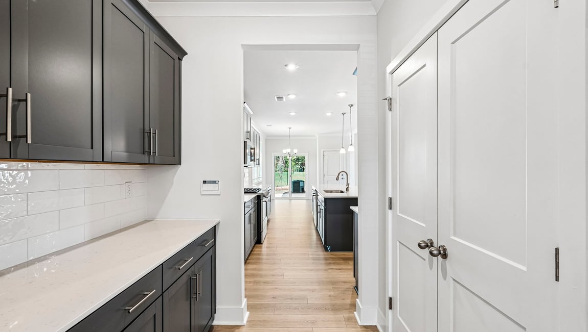 Kitchen and island with stainless steel appliances
