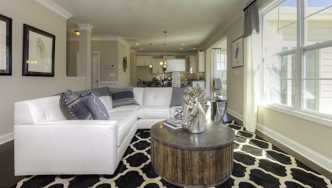 family room with large window and fireplace