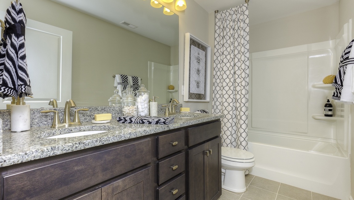 bathroom with bathtub shower combination