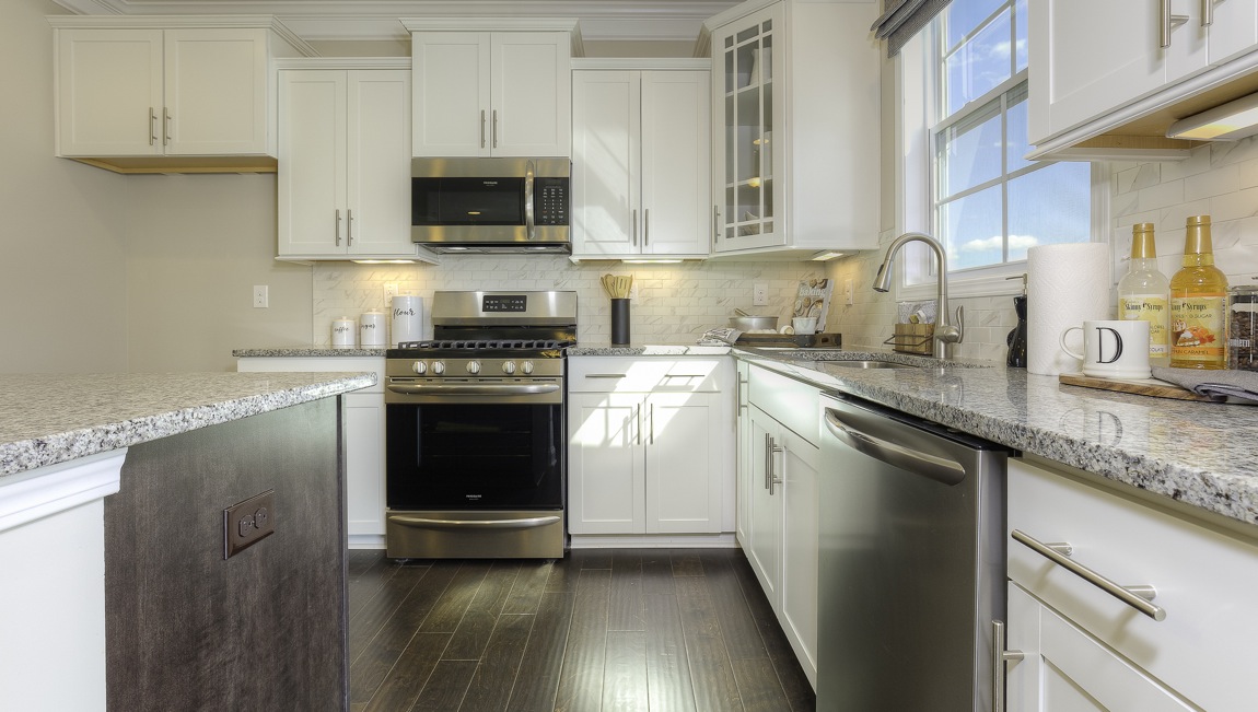 kitchen and island with stainless steel appliances
