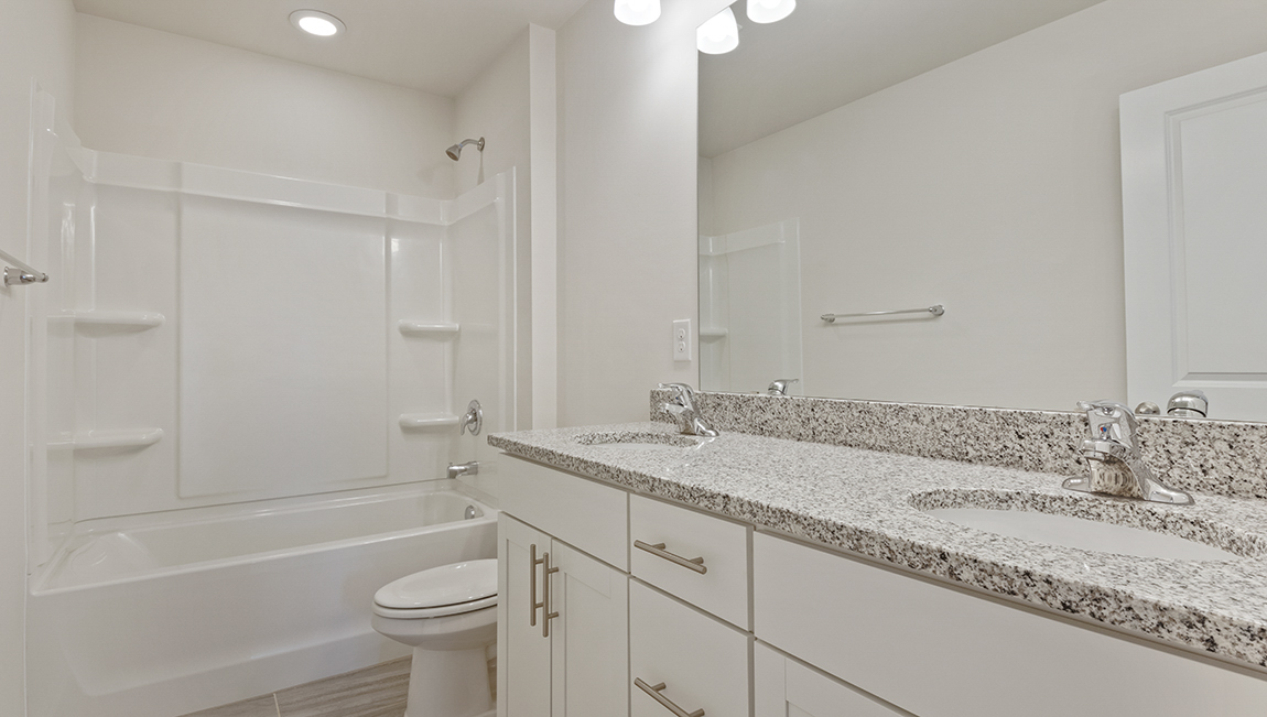 bathroom with bathtub shower combination