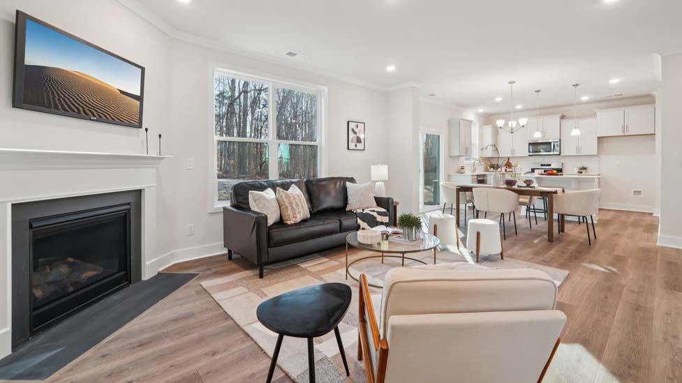 family room with large window and fireplace