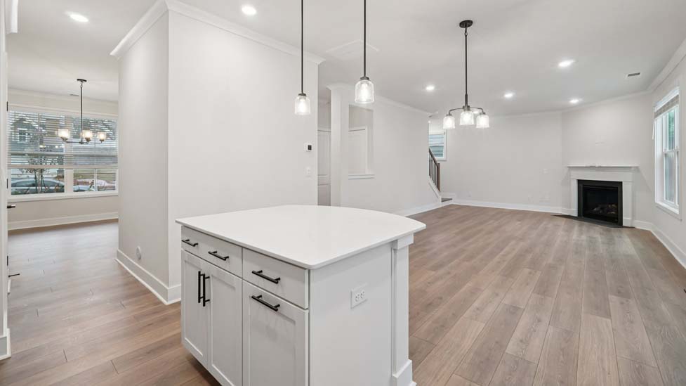 kitchen and island with stainless steel appliances