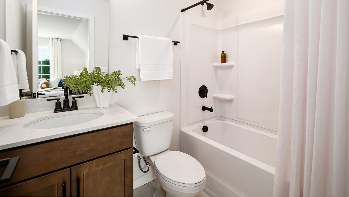 bathroom with bathtub and shower combination