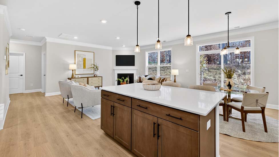 Kitchen and island with stainless steel appliances