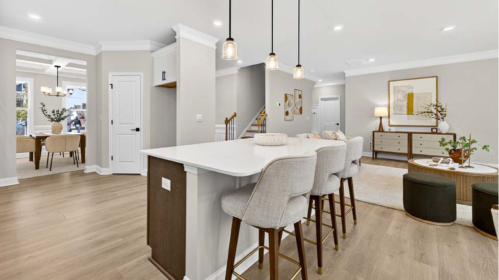 Kitchen and island with stainless steel appliances