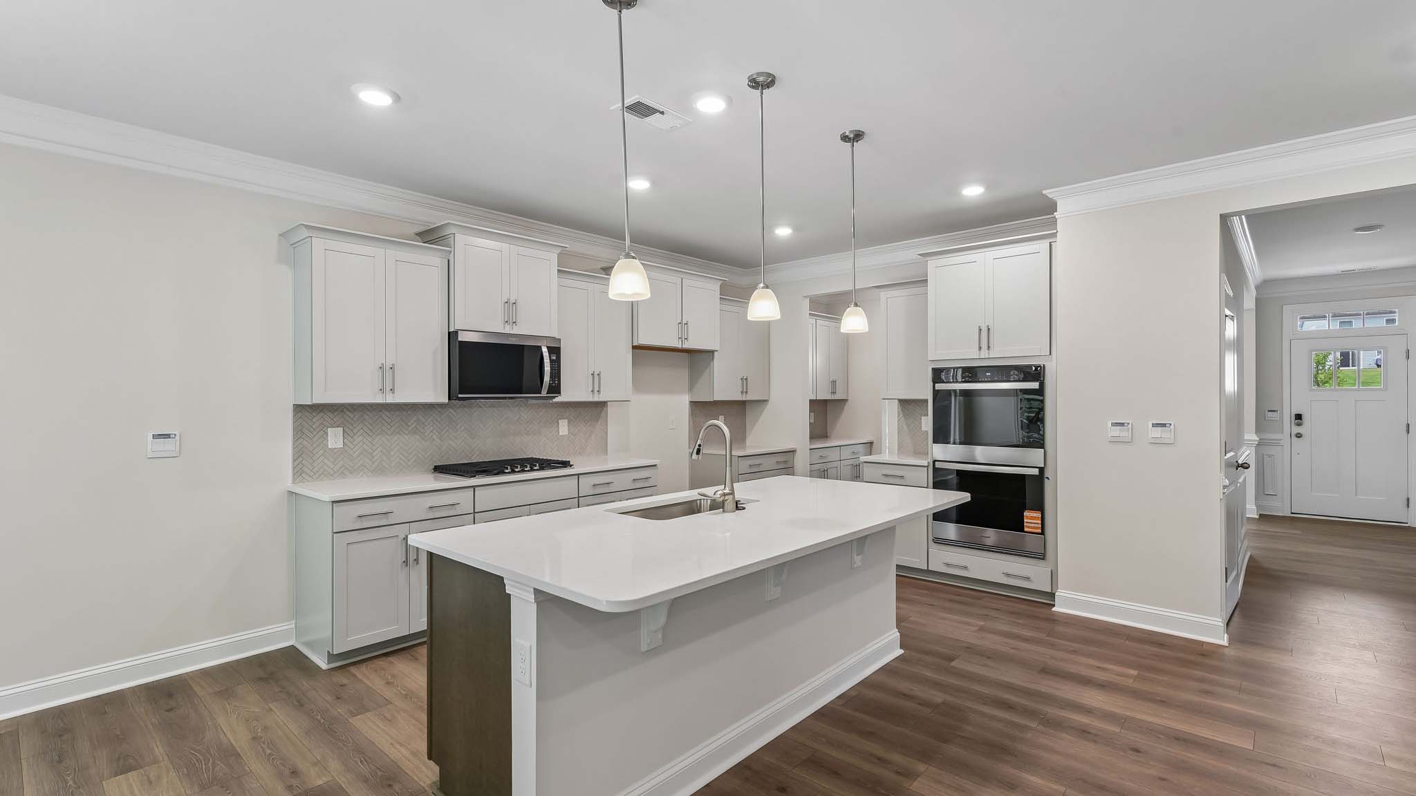 Ktichen and island with quartz countertops