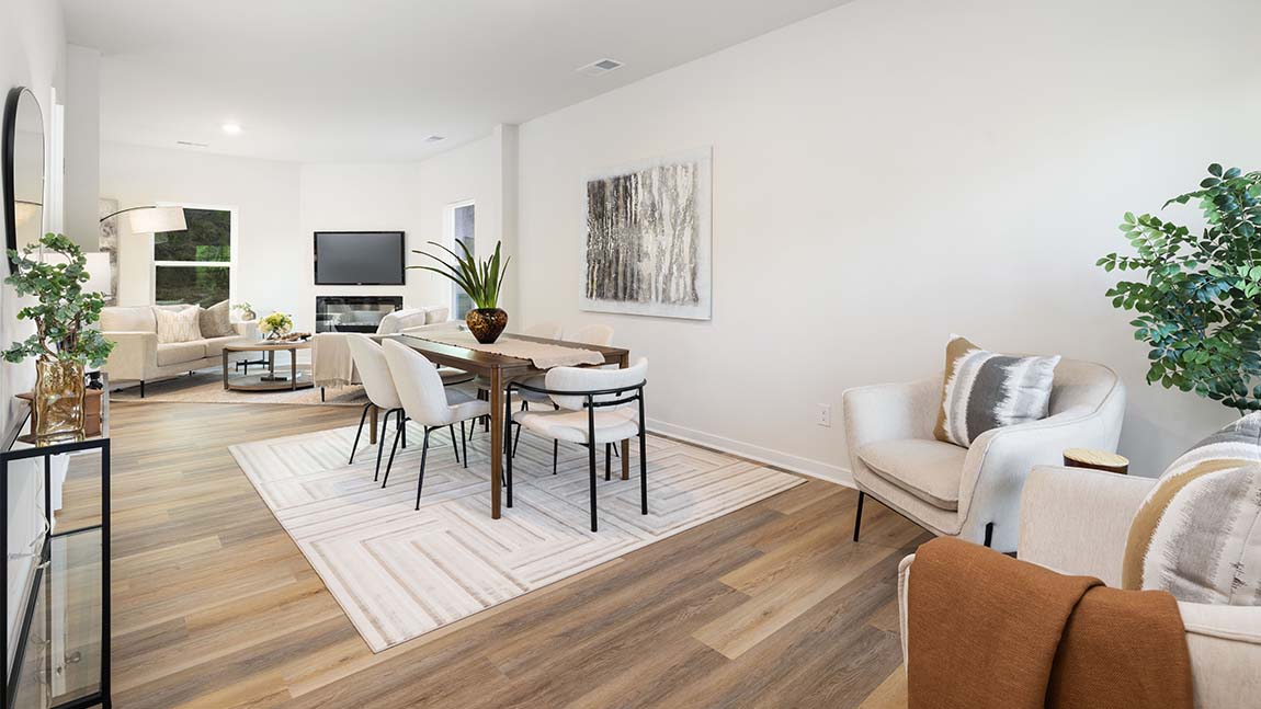 Family room with large windows and fireplace