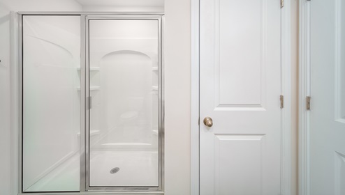 Primary bathroom with glass door shower
