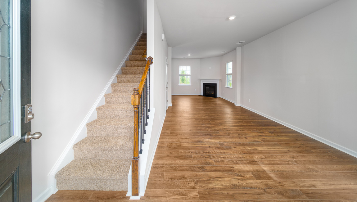 Welcoming foyer, view inside home, staircase