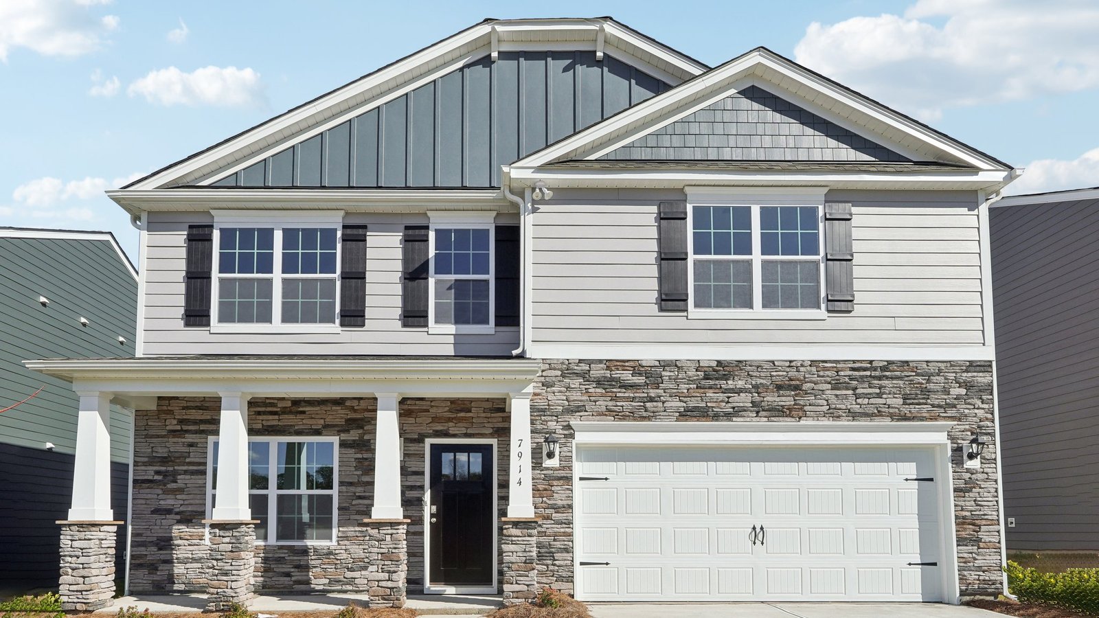 Wilmington Exterior with brick and siding and two car garage