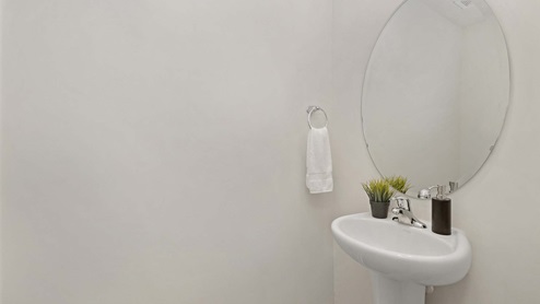 Powder bath with small sink and toilet