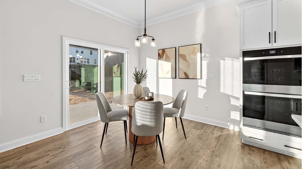 Kitchen and island with stainless steel appliances