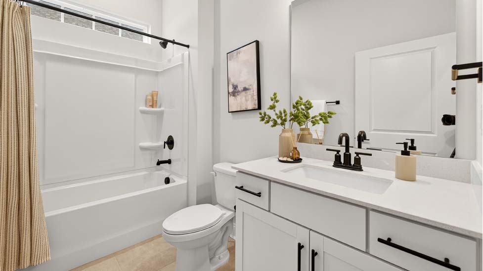 Bathroom with bathtub shower combo