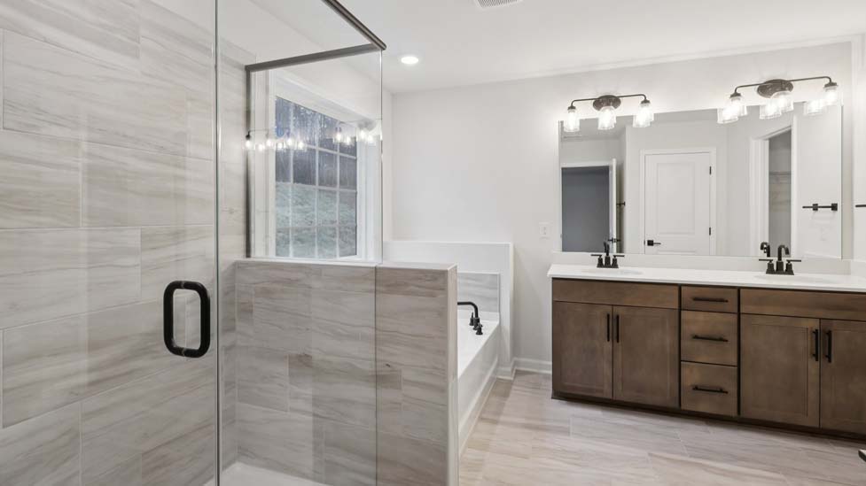 Primary bathroom with large shower and bathtub