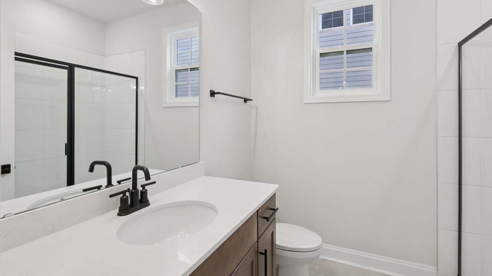 Bathroom with standing glass shower