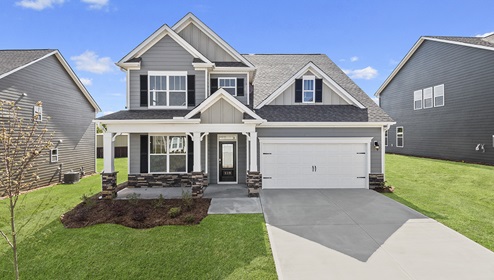 Windsor front exterior with gray siding, stone and two car garage