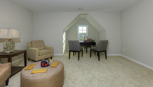Upstairs recreational room with small window