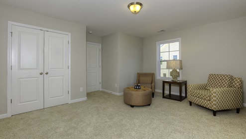 Upstairs recreational room with small window