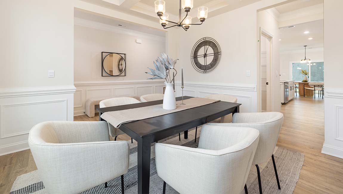 dining room with entrance way into kitchen