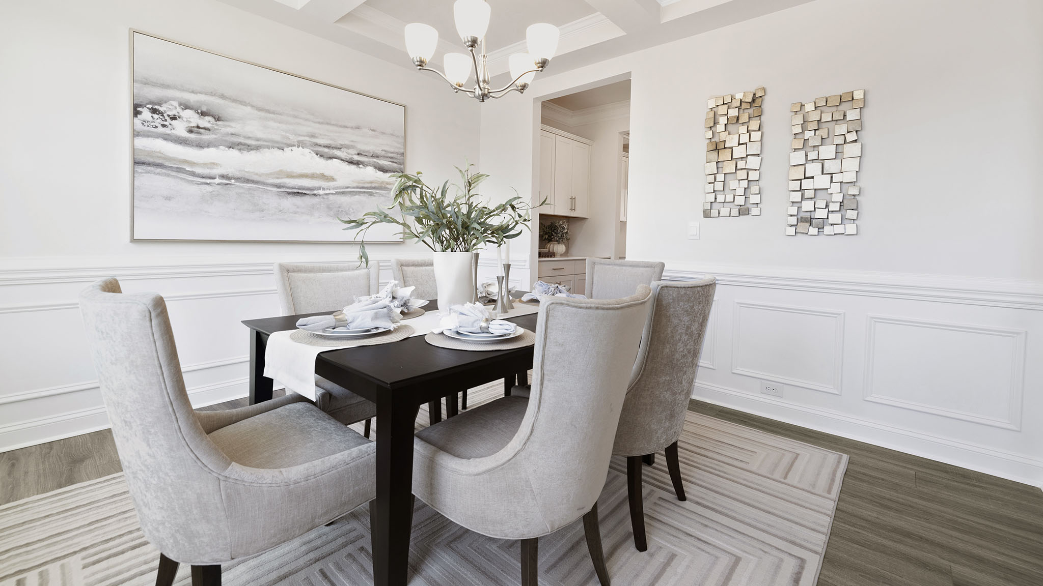 dining room with entrance way into kitchen
