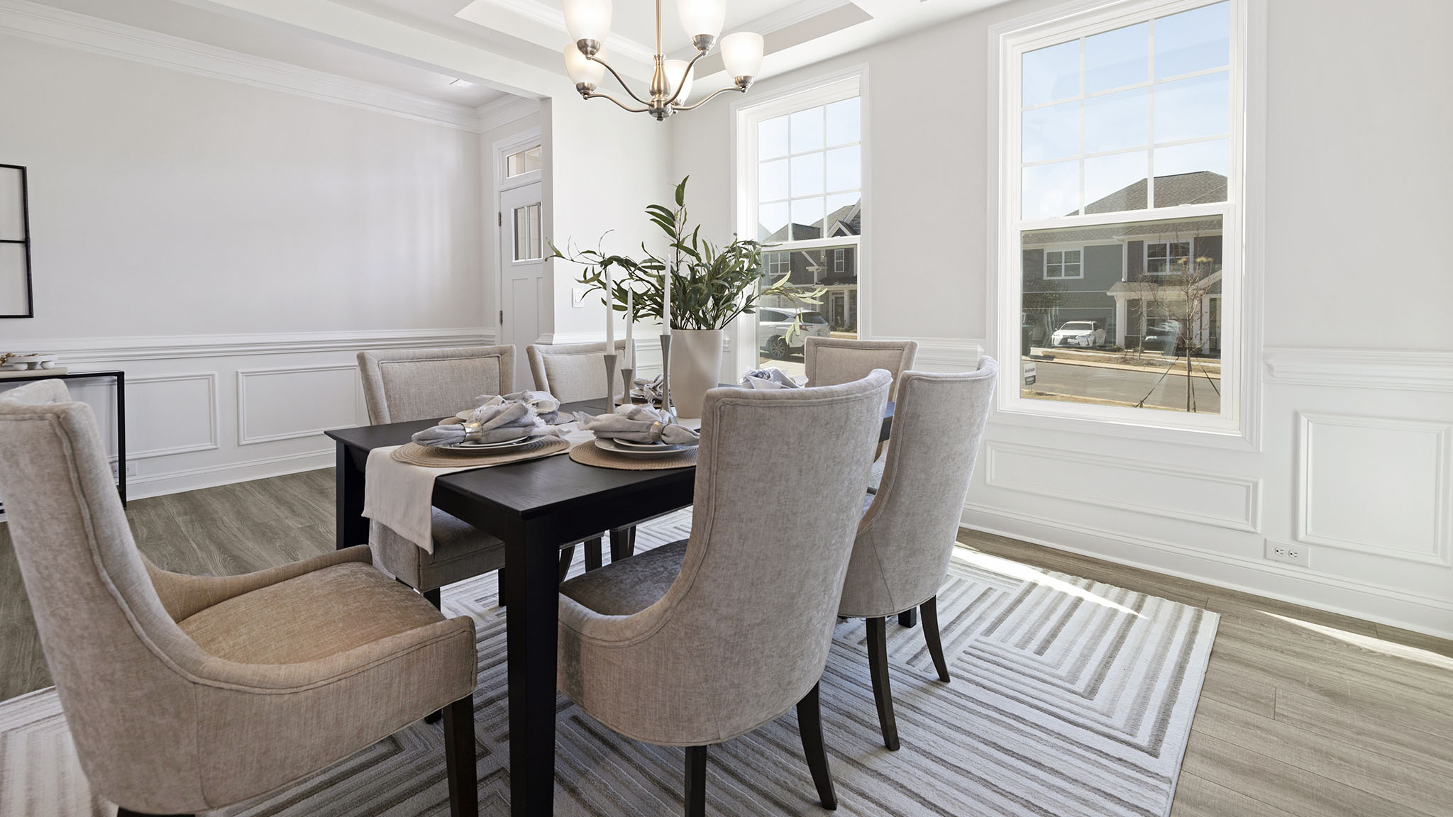 dining room with entrance way into kitchen