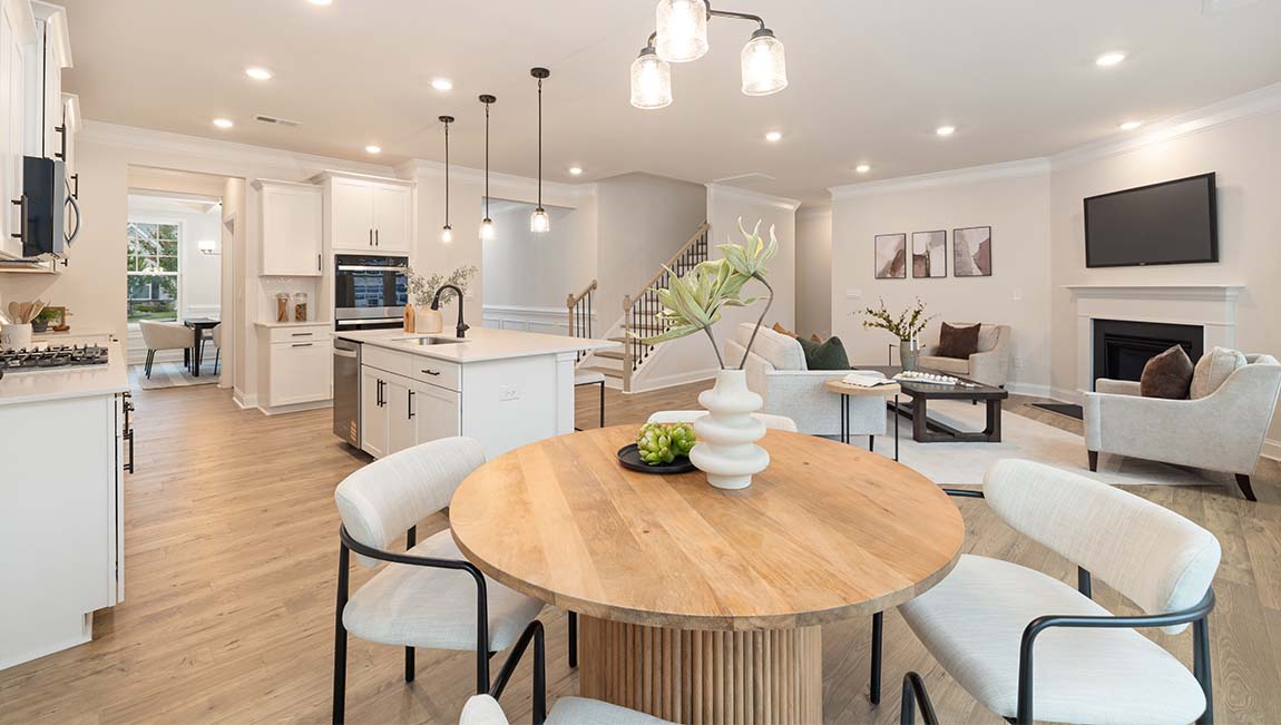 breakfast area beside kitchen and living room with sliding glass back door