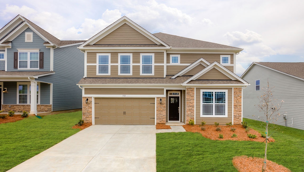Summit front exterior with siding and two car garage
