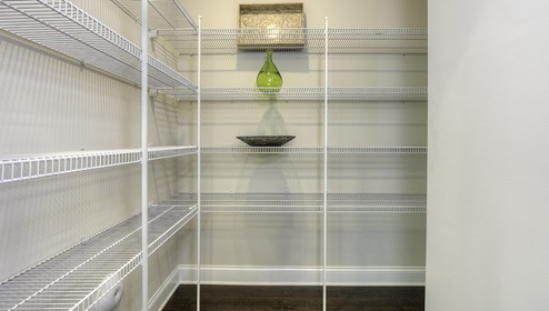 kitchen pantry with built in storage rack