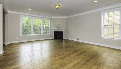 Family room with fireplace and large windows