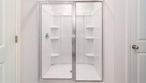 Primary bathroom glass door shower