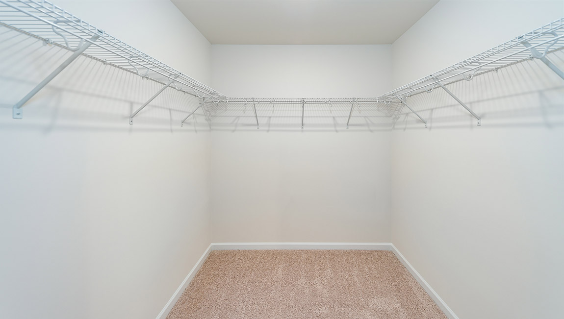 Carpeted walk in closet