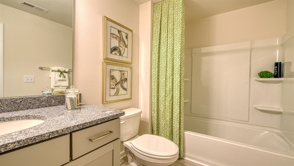 Bathroom with bathtub shower combo