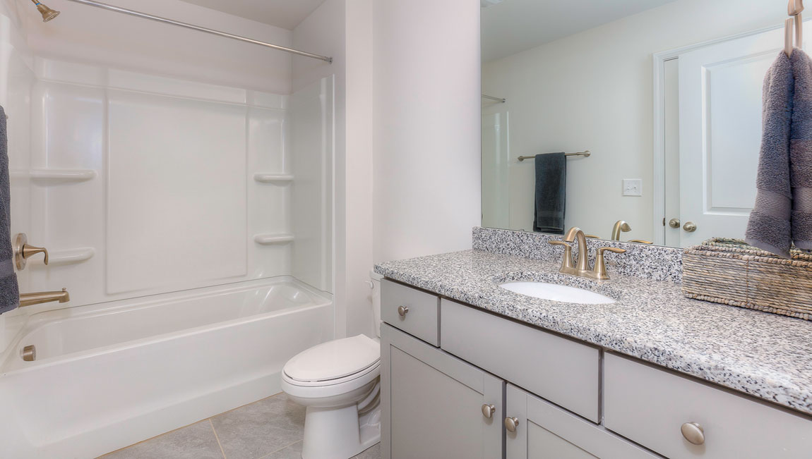 Bathroom with bathtub shower combo