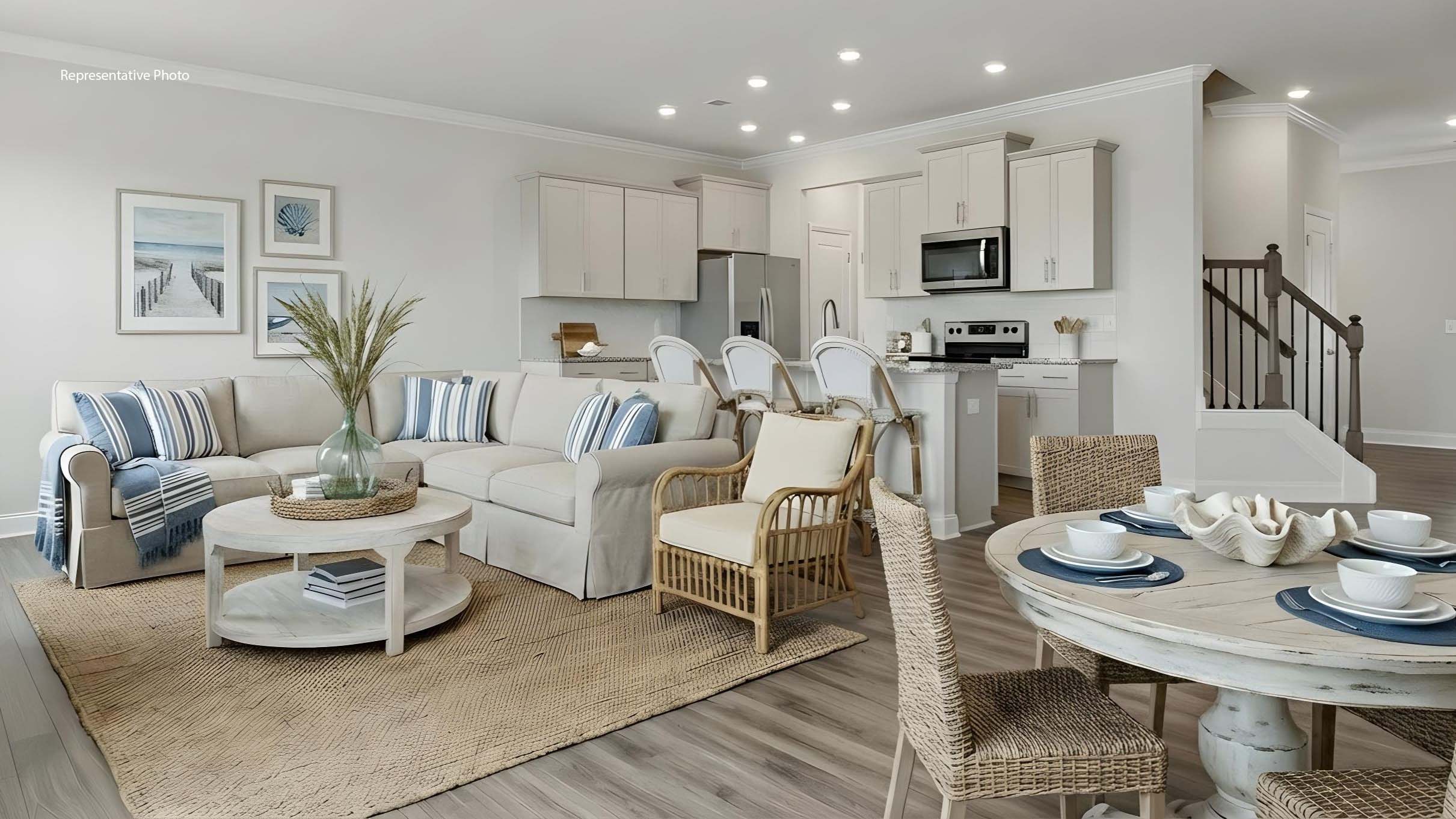 Kitchen and island with stainless steel appliances