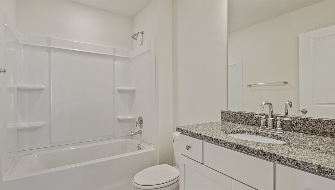 Bathroom with bathtub shower combo