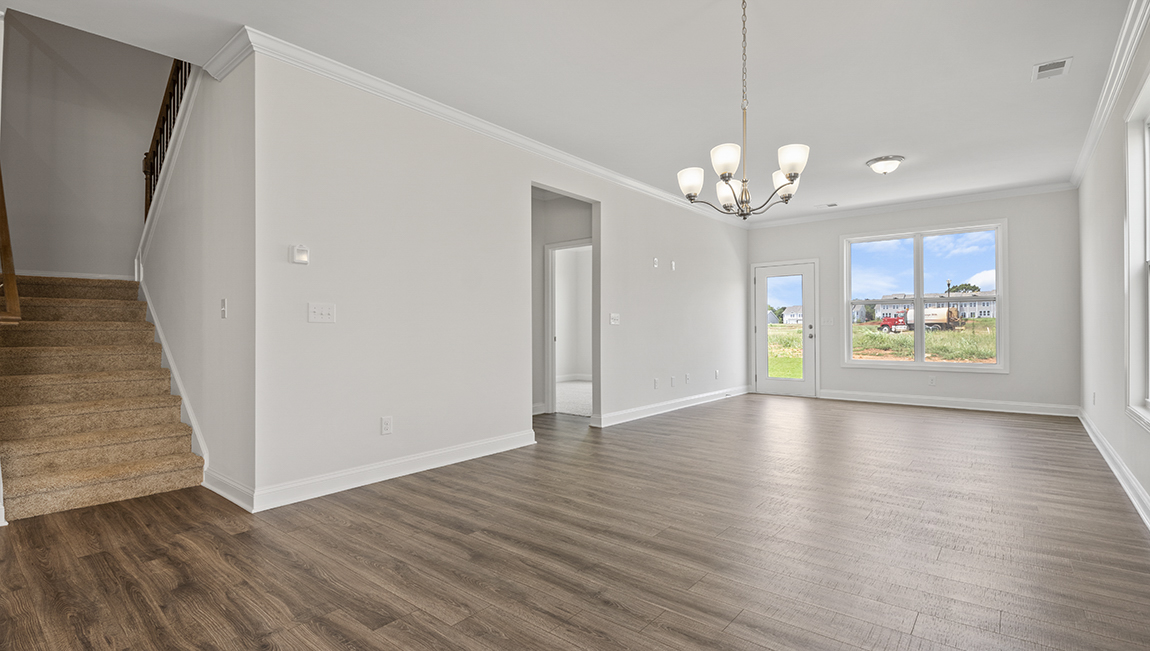 Family room with large windows, open concept