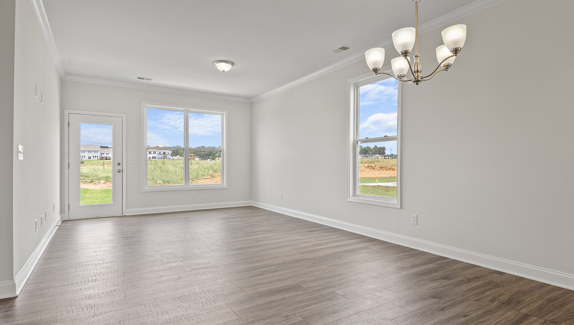 Family room with large windows, open concept