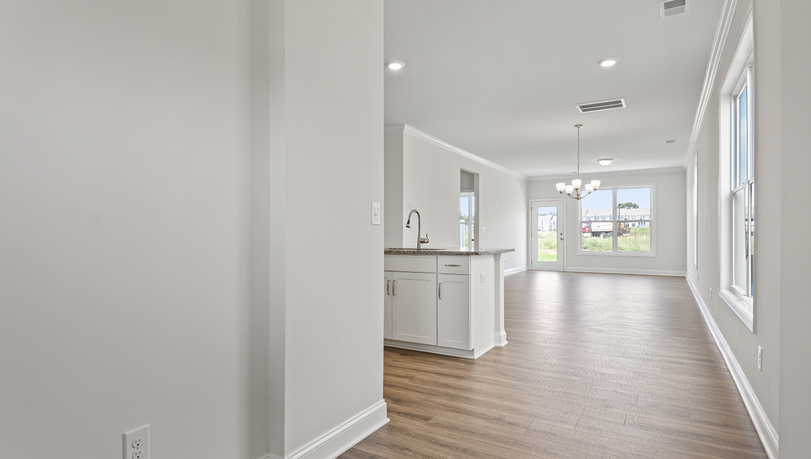 Family room with large windows, open concept